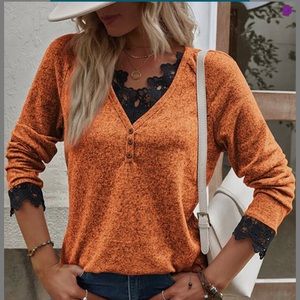 Blouse , burnt orange with black lace. Very pretty